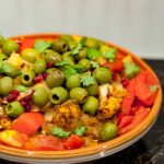 moroccan chicken tagine cooked and garnished