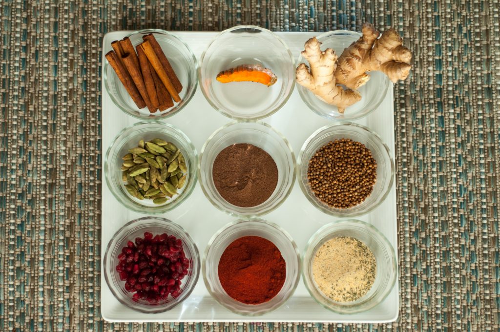 Moroccan chicken tagine spices in bowls Moroccan chicken tagine spices in bowls