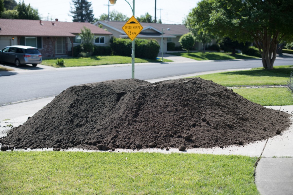 10 cubic yards of lovely dirt humps on my driveway