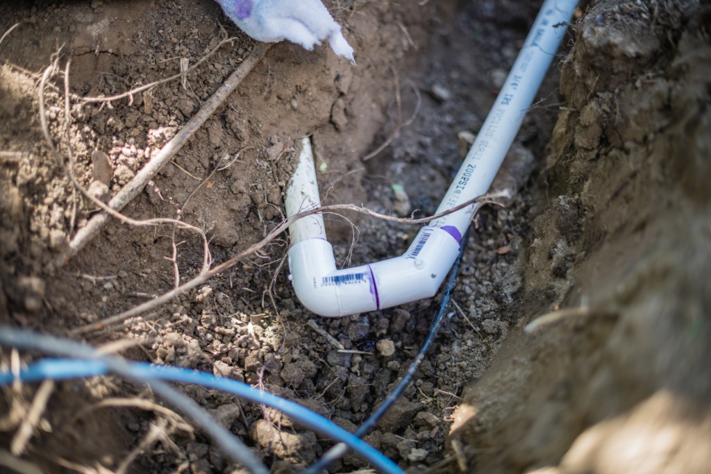 Waiting for the pvc irrigation pipe cement to cure and set