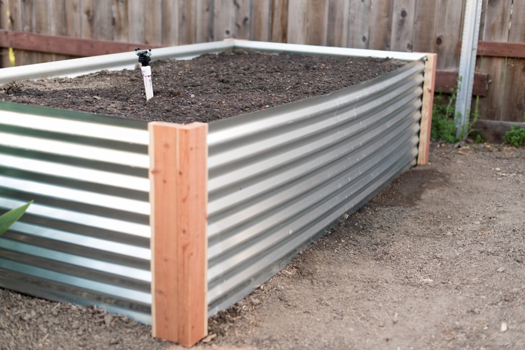 Attaching irrigation valves for each raised metal garden bed