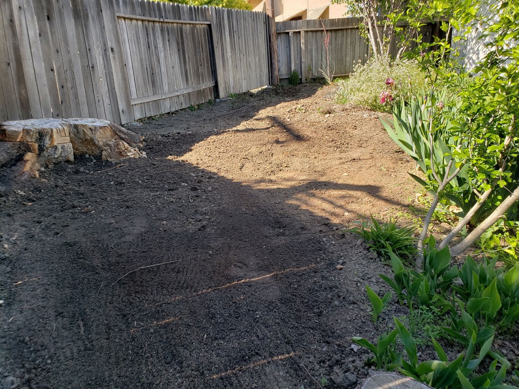 Grading dirt for metal raised garden beds