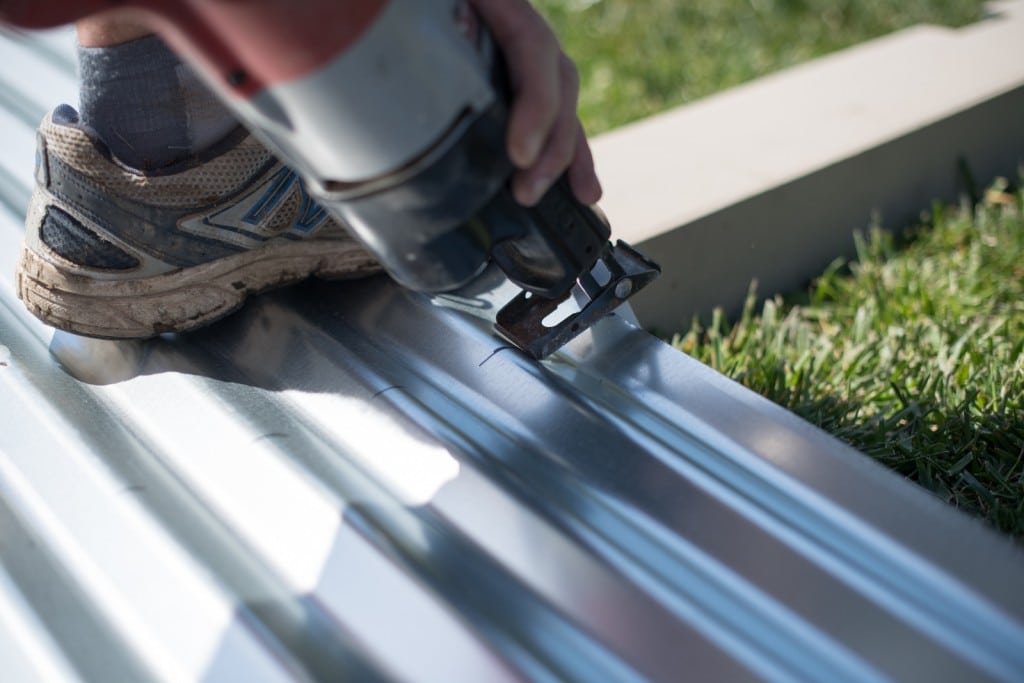 Cutting the corrugated metal sheets with a reciprocating saw