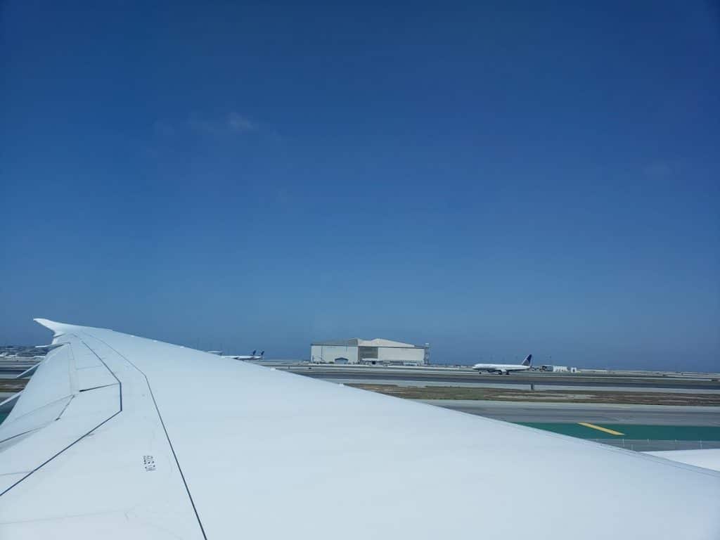Sfo on fligboarding and taxiing down the runwayht leaving to italy