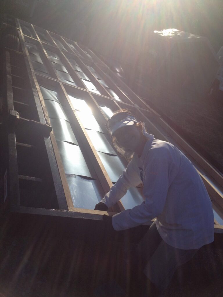 Mrs. Epic laying the subfloor