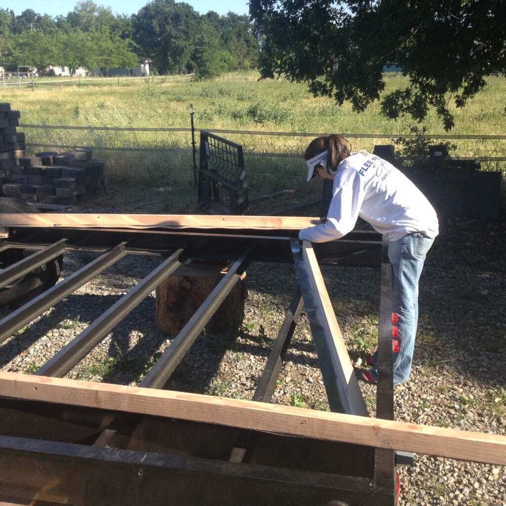 Mrs. Epic working on galvanized steel flashing inserts