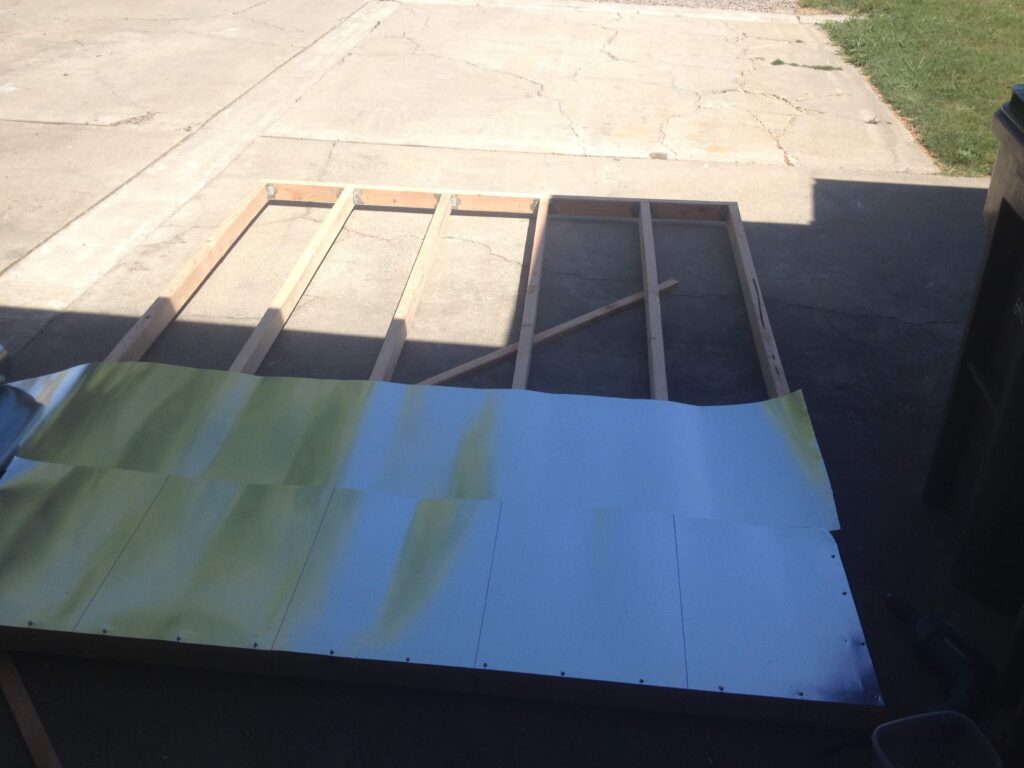 Preparing subfloor box sections with galvanized steel flashing
