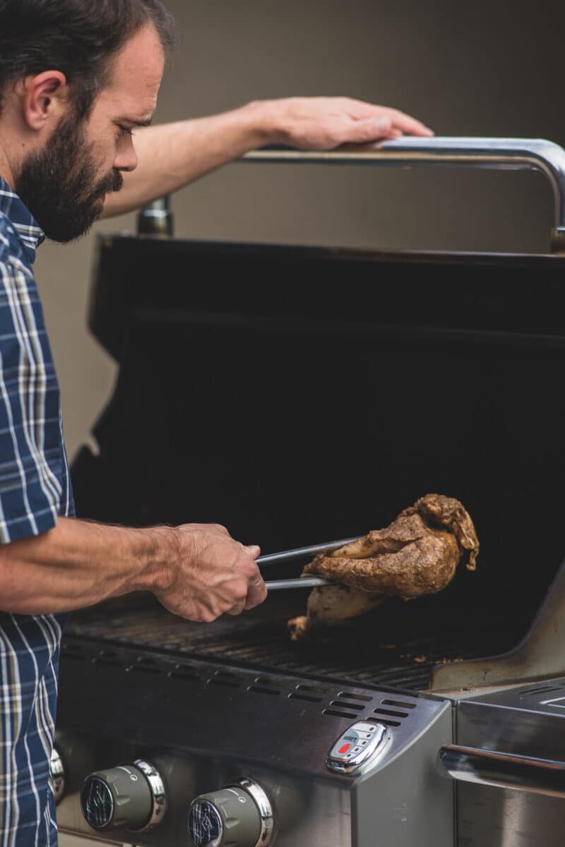 Jerk chicken place on the grill