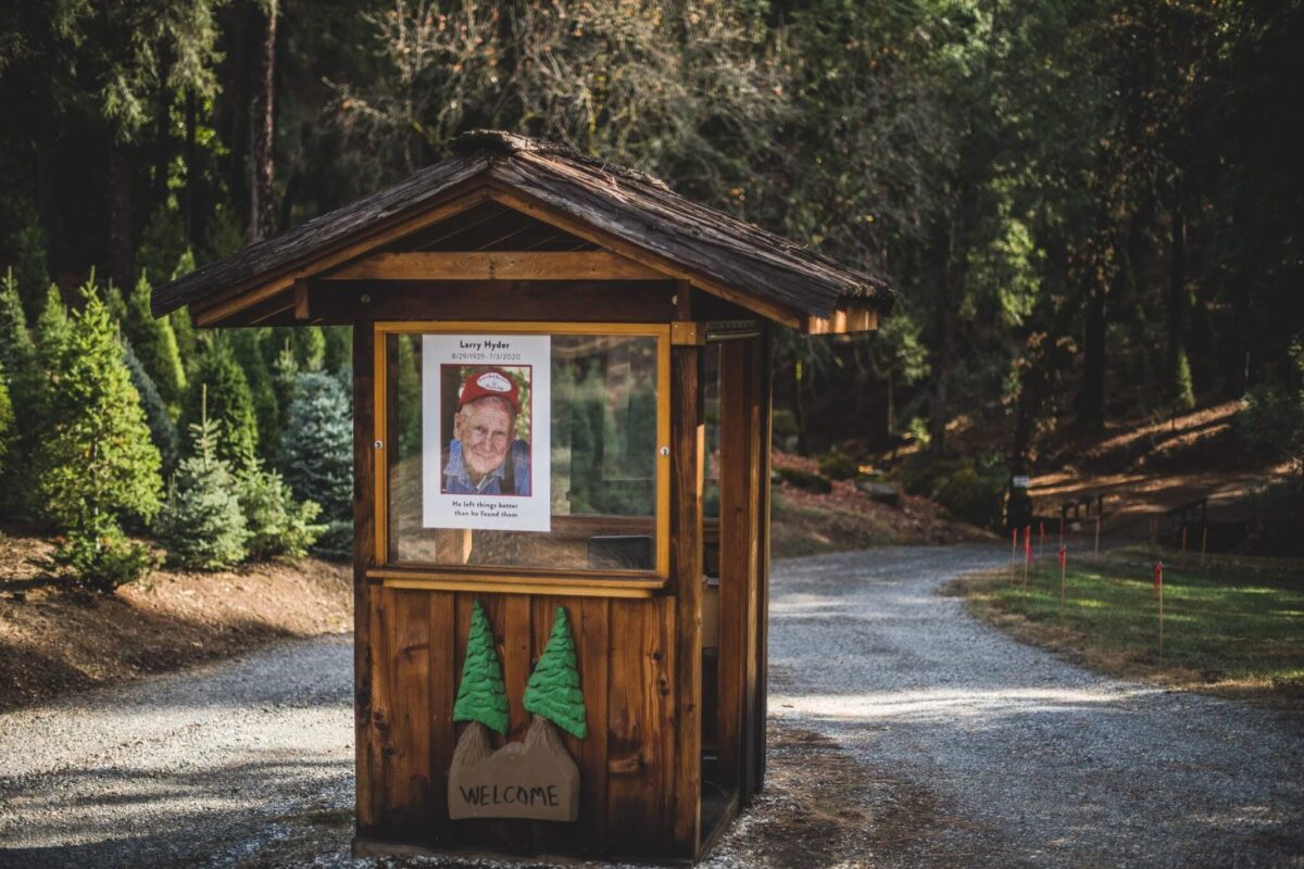 Front booth at indian rock tree farm with a picture of larry hyder