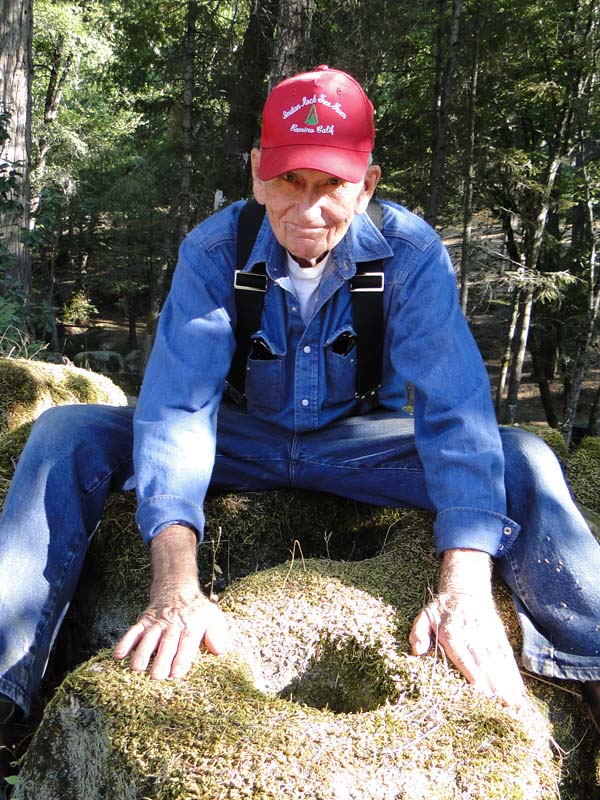 Larry hyder with a native american grinding stone