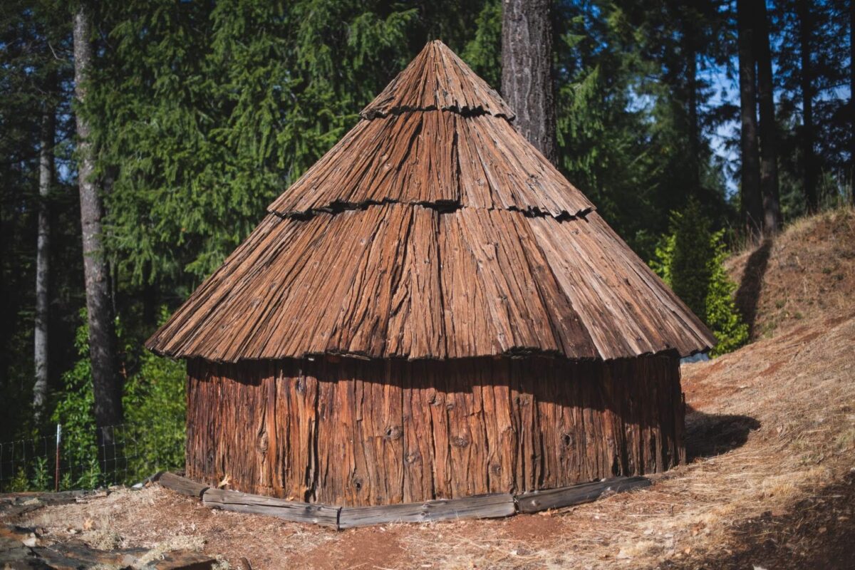 Replica of a traditional native american hut full of animal hides