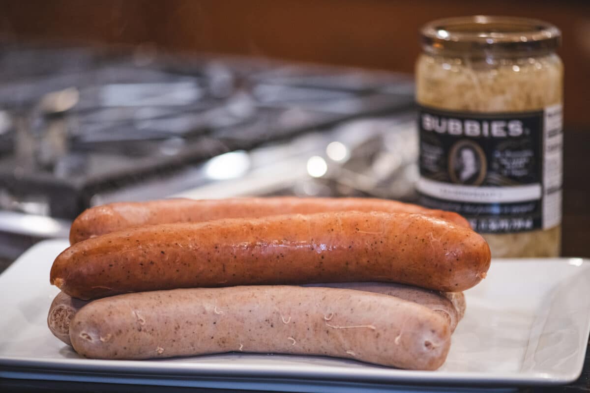 Remove sausages from water and let sit until ready to brown and serve.