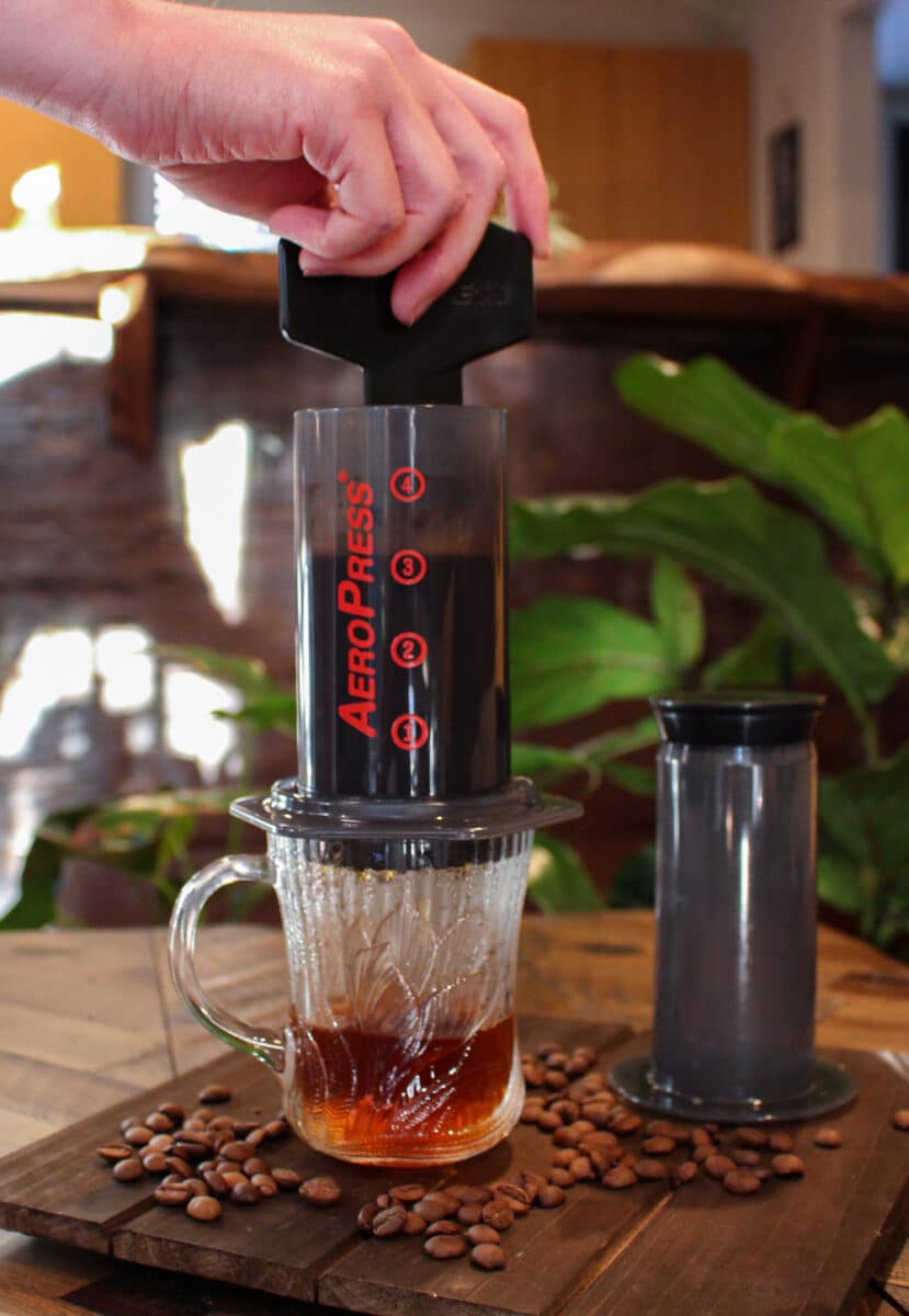 Aeropress coffee maker stirring coffee