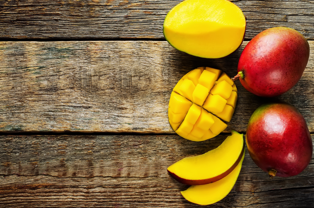 Revitalizing mango-berry protein smoothie cutting board