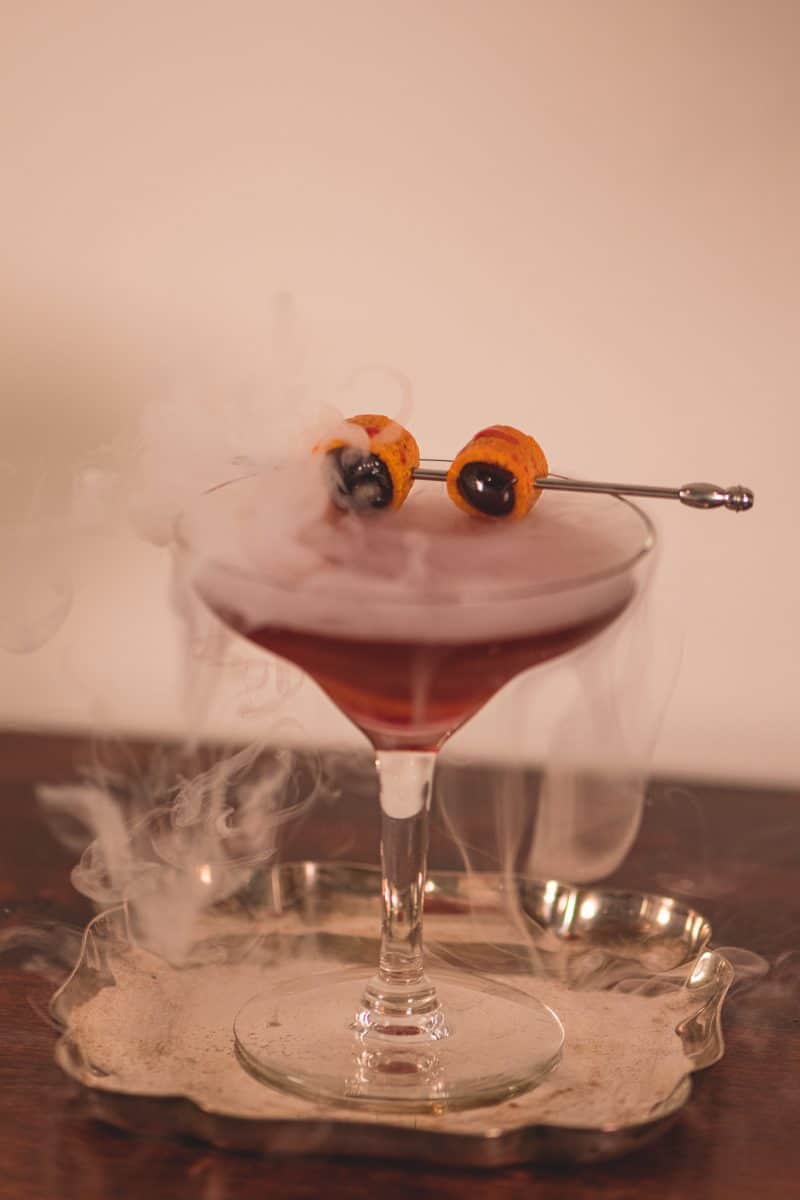 Blood and sand cocktail with dry ice