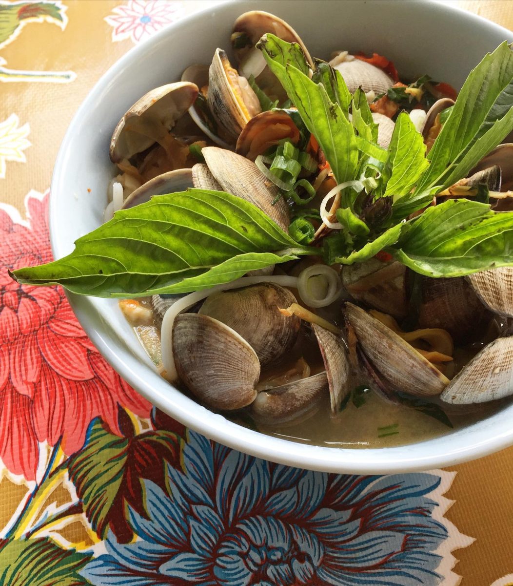 Stir-fried manila clams with chiles, galangal, garlic, krachai and thai basil
