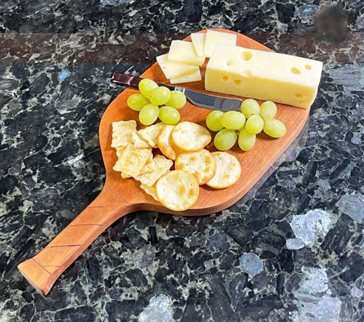 Pickleball gift guide paddle charcuterie board