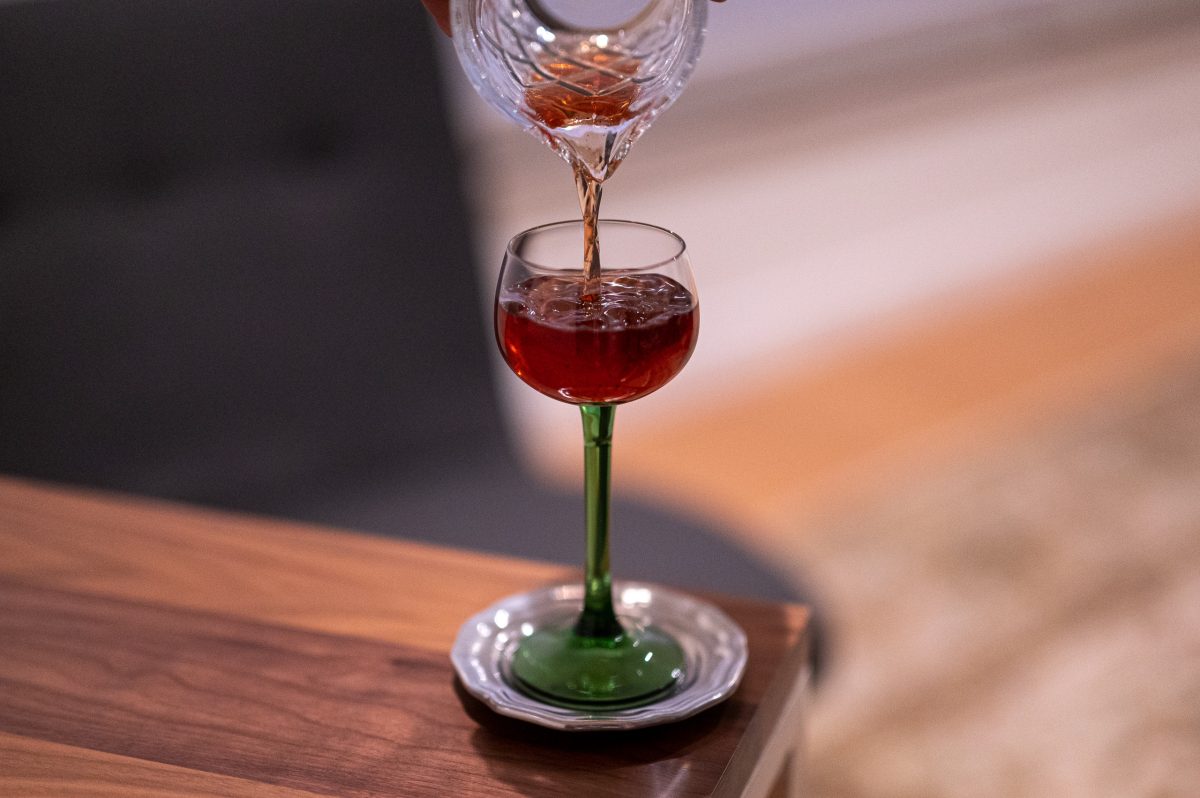 The gibney cocktail recipe pouring