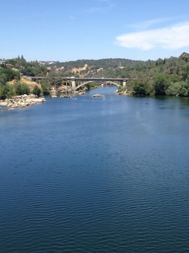 Lake natoma old bridge paddle boarder