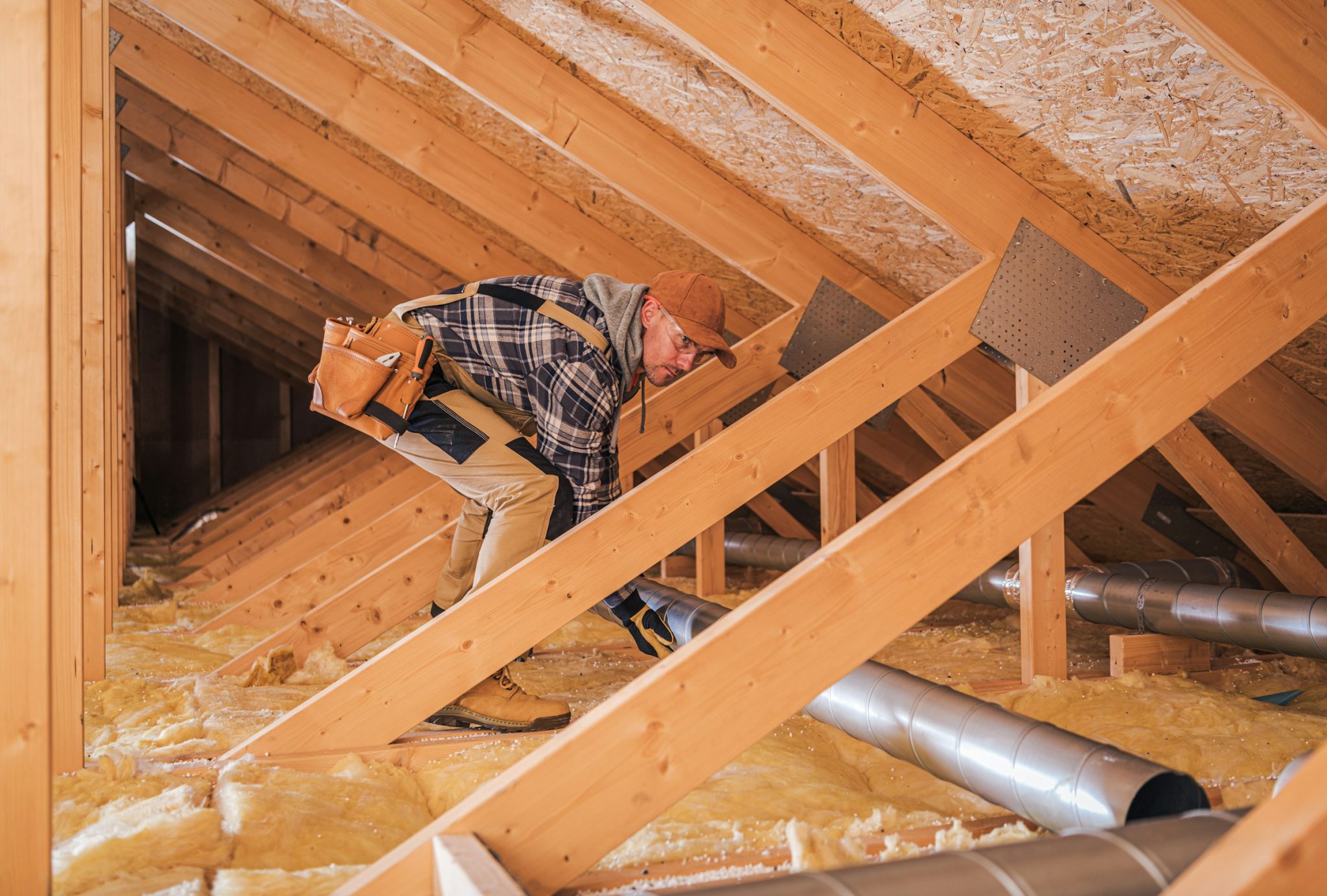 How can attic insulation save on home energy bills?