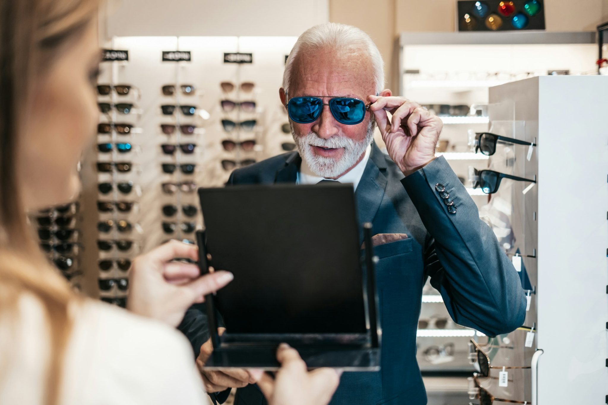 Elevate your suit game with a colorful accessory