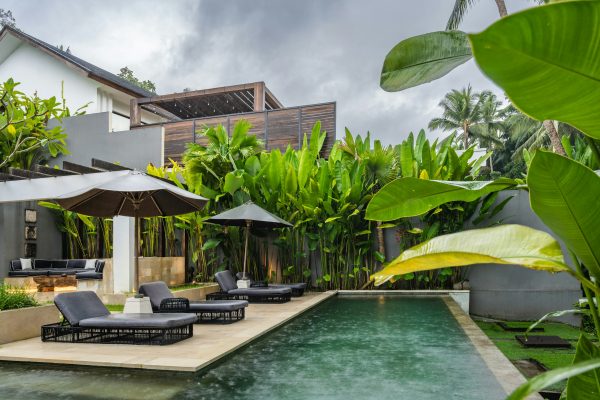 How thoughtful poolside seating transforms outdoor relaxation spaces 5 a backyard pool is a major investment that adds value to a home and provides a place for summer fun. Most homeowners focus on the water features and tile choices during the building process. They often forget that the area surrounding the water is where people spend the most time. Having a well-planned deck makes the difference between a simple swimming spot and a true outdoor retreat. By picking the right furniture and layout, you can turn a basic yard into a space that feels like a private resort. How thoughtful poolside seating transforms outdoor relaxation spaces