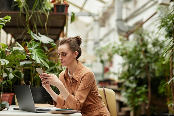 When should a startup upgrade from free to paid ai ad tools?