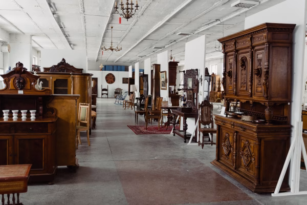 Homepage 10 explore sacramento A showroom of antique wooden furniture on display in a sacramento shop