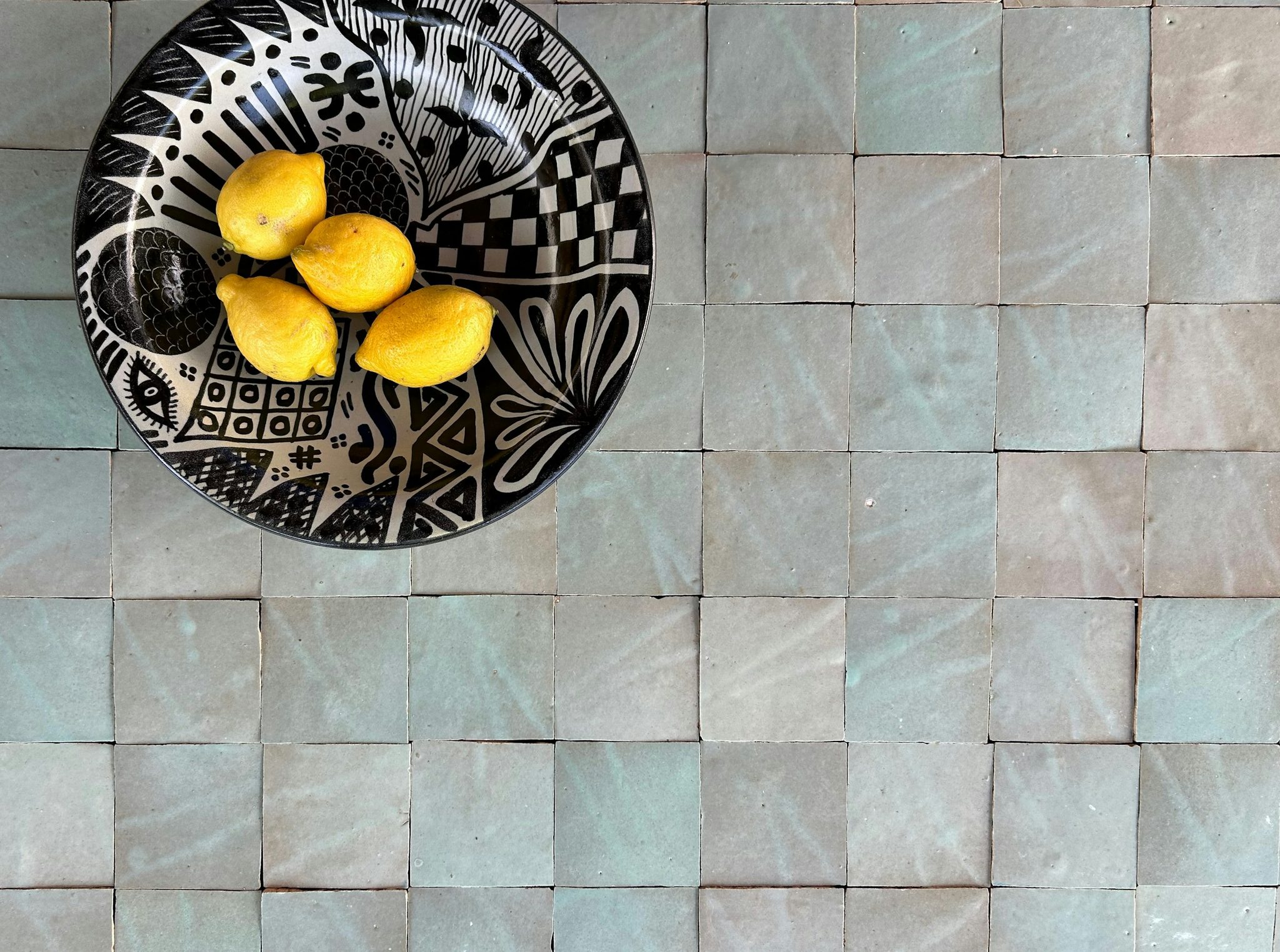 Handmade zellige tile vs ceramic tile: which option elevates your space?