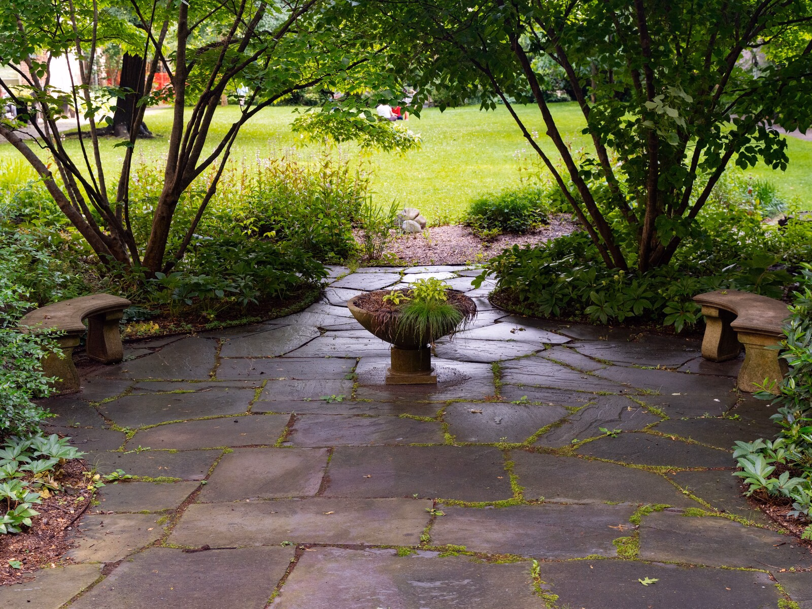 Which natural stones suit a wet look sealer? 1 choosing a finish for natural stone starts with knowing exactly how each stone behaves. Some stones gain dramatic depth from a wet look coating, while others barely change. Porous stone sealed with tss pro stone sealants ends up richer in tone than stone under standard clear coatings. A pale, dense slab and a dark, open one rarely end up looking alike after sealing. A homeowner who checks how each stone responds before starting is less likely to face a costly redo. Here is a quick guide to the stones that suit this kind of finish. Flagstone patio with stone benches and a planter in a shaded garden